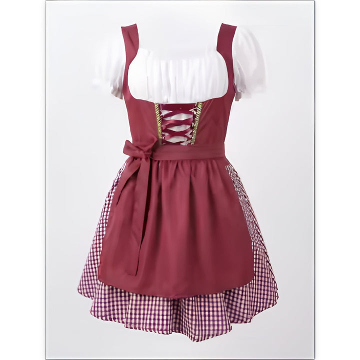 Vínově červené dirndl s bílou nabíranou halenkou, šněrováním na živůtku a kostkovanou sukní, nafocené samostatně zepředu. 1