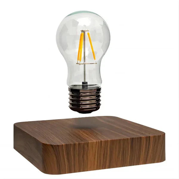 Schwebende Glühbirne auf Holzsockel, magnetische LED-Lampe, moderne Tischdekoration.