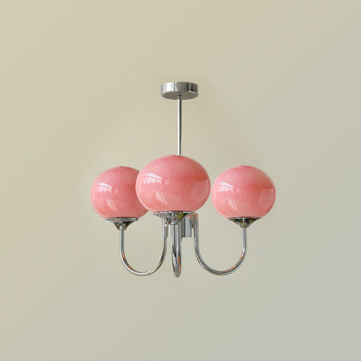 Rosa Kronleuchter mit drei Glaskugeln, modernes Design, Chromgestell, Wohnzimmerbeleuchtung.