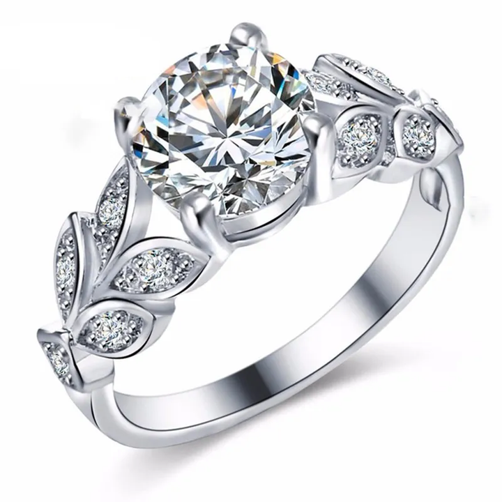 Silberner Verlobungsring mit großem Zirkonia-Stein und Blattdesign, eleganter Schmuck.