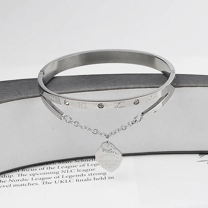 Silbernes Edelstahl-Armband mit römischen Ziffern und Kristallen, elegantes Schmuckdesign