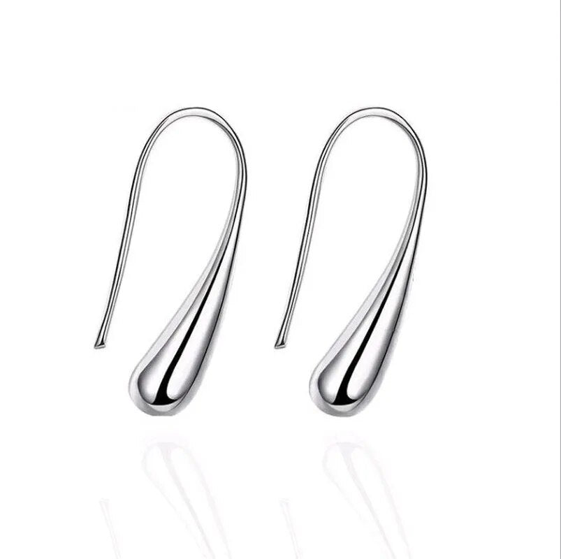 Silberne Tropfen-Ohrringe, minimalistisches Design, eleganter Schmuck für Damen.