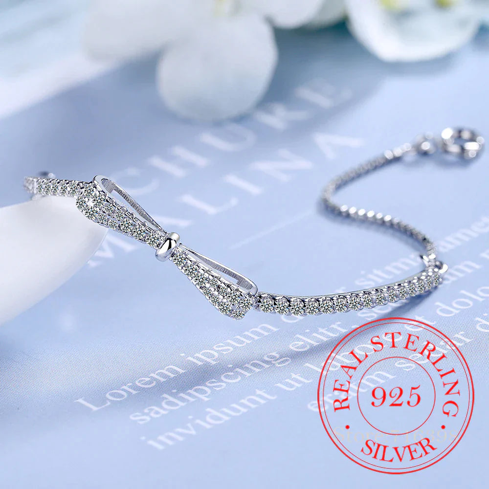 Silberarmband mit Schleife, Zirkonia, 925 Sterling Silber, Damen-Schmuck, elegant, funkelnd.