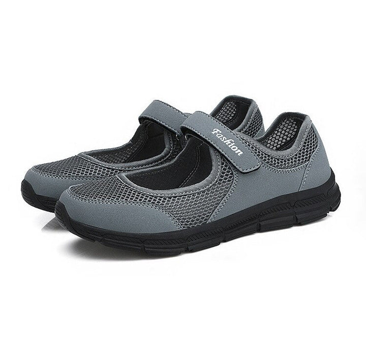 Graue Mesh-Sneaker, atmungsaktiv, komfortabel, Klettverschluss, Damen-Freizeitschuhe.
