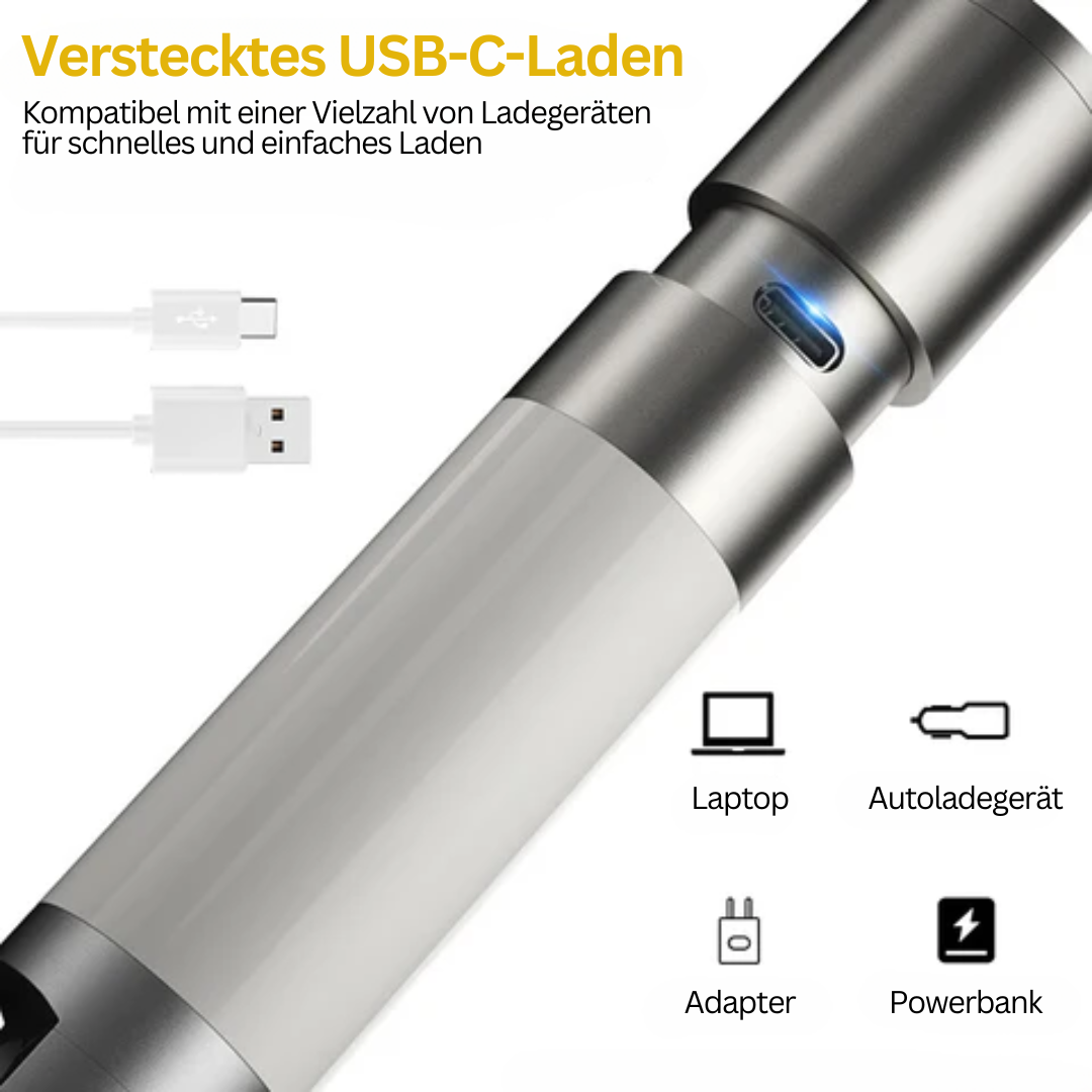Tragbare silberne Powerbank mit USB-C-Anschluss, kompatibel mit Laptop und Autoladegerät.