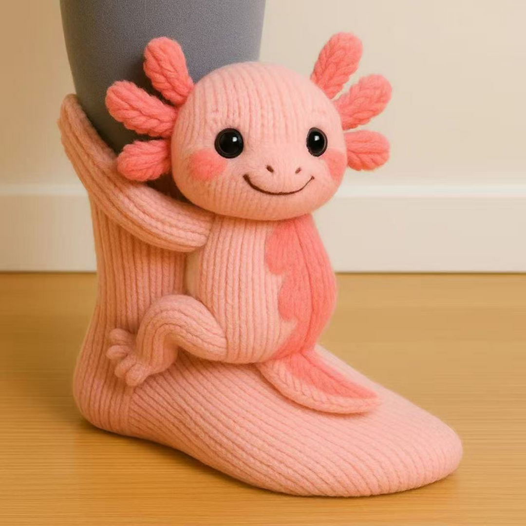 Lososově růžová pletená ponožka s detailem 3D axolotla, který se opírá o nohu 16
