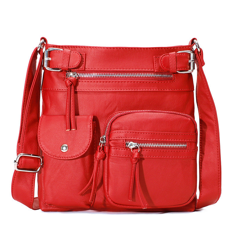 Rote multifunktionale Anti-Diebstahl-Tasche, modisch, mit Reißverschlüssen und Fächern.
