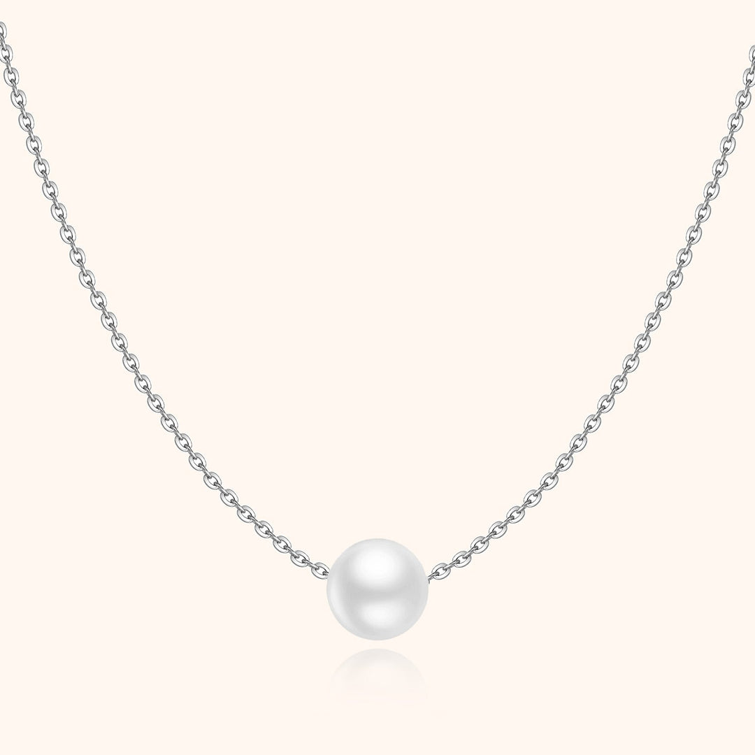 Silberkette mit weißer Perle, elegantes Schmuckstück, Damenhalskette, minimalistisches Design.
