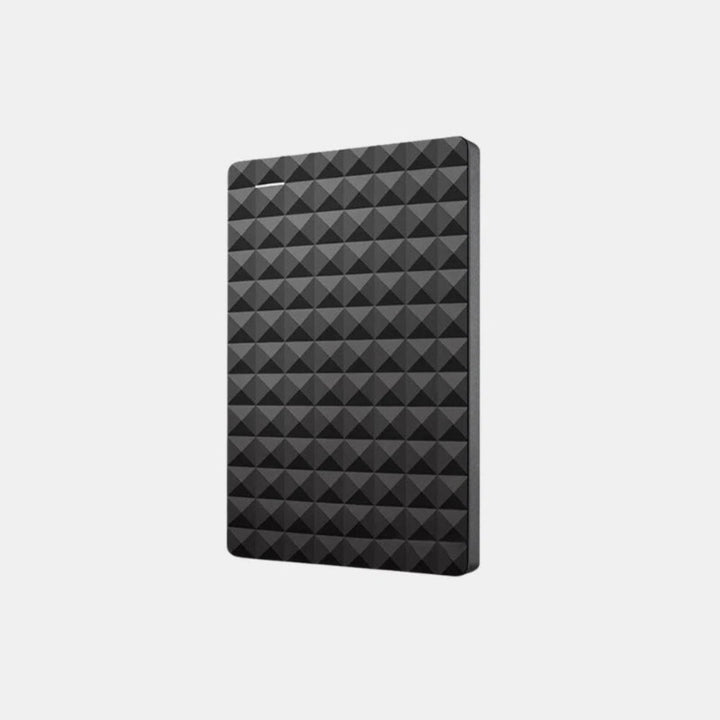 Černý disk s pyramidovým vzorem na světlém neutrálním pozadí, produktový záběr z nadhledu 7