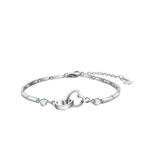Silbernes Armband mit Herzanhänger und Zirkonia, eleganter Schmuck für Damen.