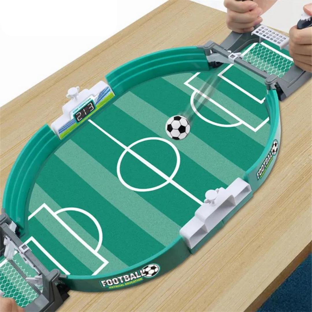 Tischfußballspiel aus Kunststoff, grün, mit Toren und Ball, ideal für Kinder, Indoor-Spielzeug.