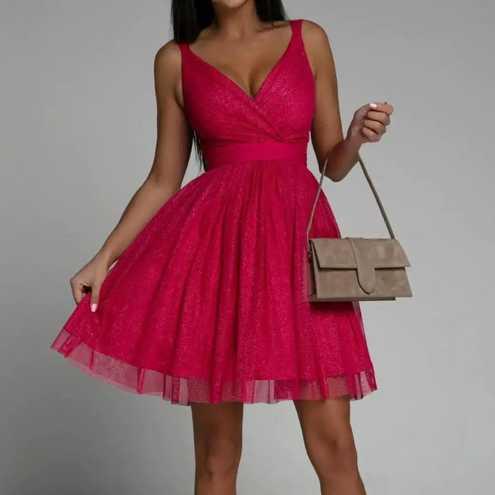 Fuchsia Partykleid ärmellos, Pailletten, rückenfrei, kurze Länge, elegante Abendmode.