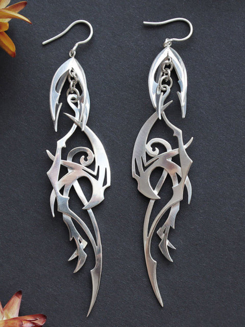 Silberne, geometrische, spiralförmige Ohrringe, Vintage-Design, kreativer Schmuck.
