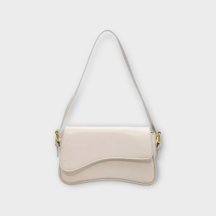 Weiße Lederhandtasche mit goldenen Details, elegantes Design, Damenmode Accessoire.