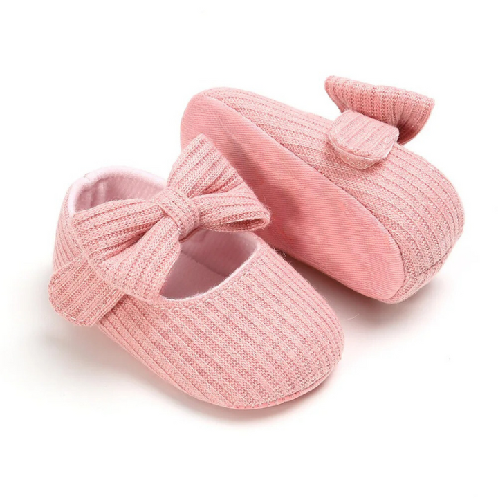 Rosa Babyschuhe mit Schleife, gestrickt, rutschfest, Neugeborene, Geschenk, modisch.