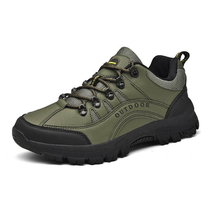 Grüner Outdoor-Wanderschuh, rutschfeste Sohle, robustes Design, ideal für Trekking.
