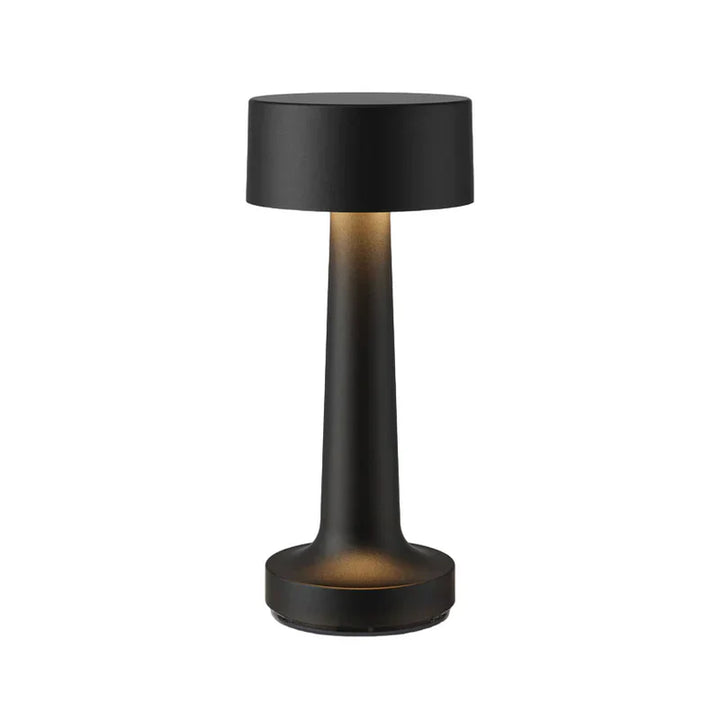 Schwarze zylindrische Tischlampe, kabellos, ideal für Restaurant oder Bar, modernes Design.
