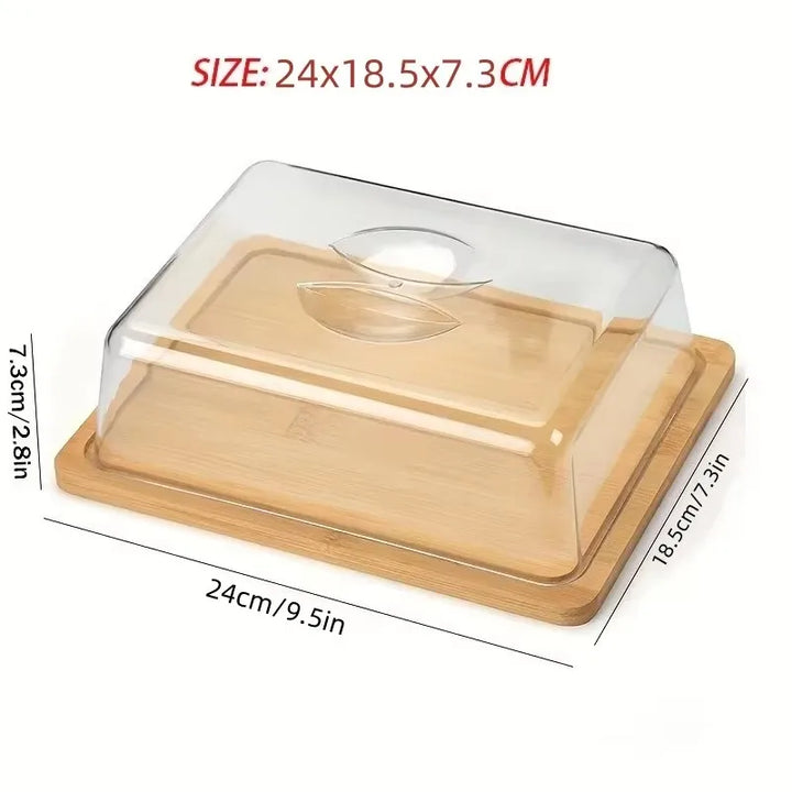 Rechteckige Bambus-Käseglocke mit transparentem Deckel, 24x18,5x7,3 cm, ideal für Küche.