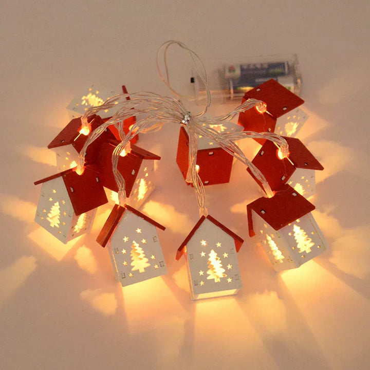LED-Lichterkette mit roten Häuschen, Weihnachtsbaum-Motiv, batteriebetrieben, warmweißes Licht.