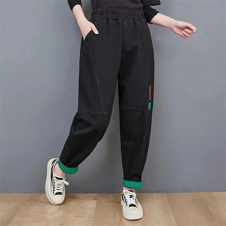 Damen schwarze Jogginghose, elastischer Bund, lässig, Baumwolle, Streetwear, Mode.