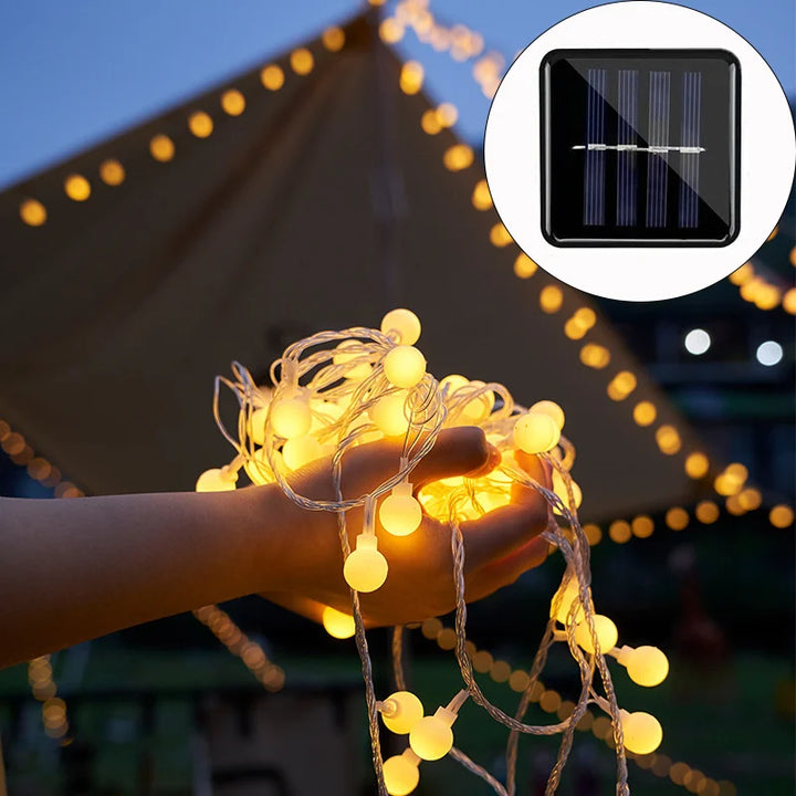 Solarbetriebene Lichterkette, warmweiß, für Außenbereich, energiesparend, dekorativ.