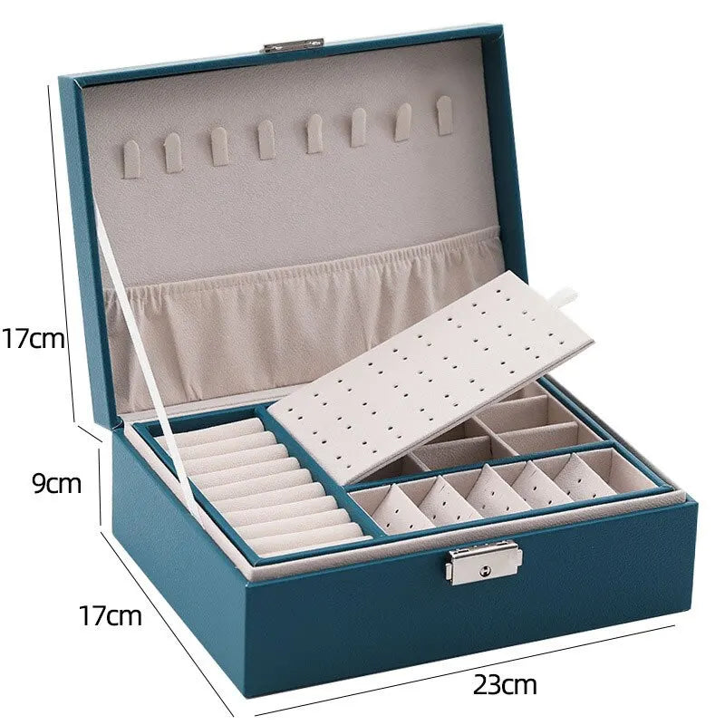 Blaue Schmuckbox aus Leder mit Fächern und Haken, 23x17x9 cm, ideal zur Schmuckaufbewahrung.
