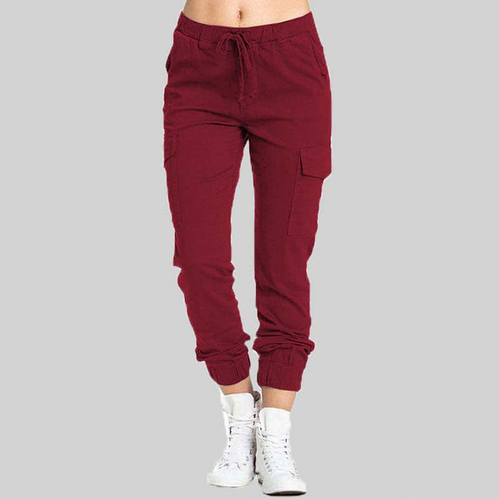 Damen Jogginghose, rot, mit Taschen, elastischer Bund, Freizeithose, bequem, modisch.