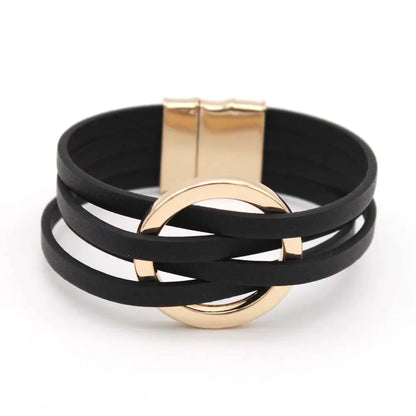 Schwarzes Lederarmband mit goldener Schnalle, modisches Accessoire für Damen.