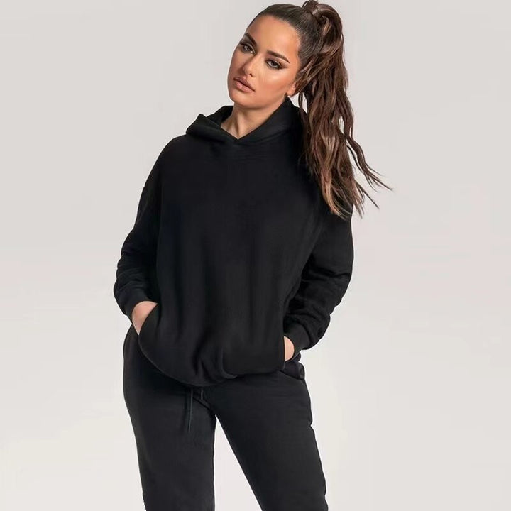 Schwarzer Damen-Hoodie, lässig, bequem, Kapuze, langärmelig, Freizeitmode, Baumwolle.