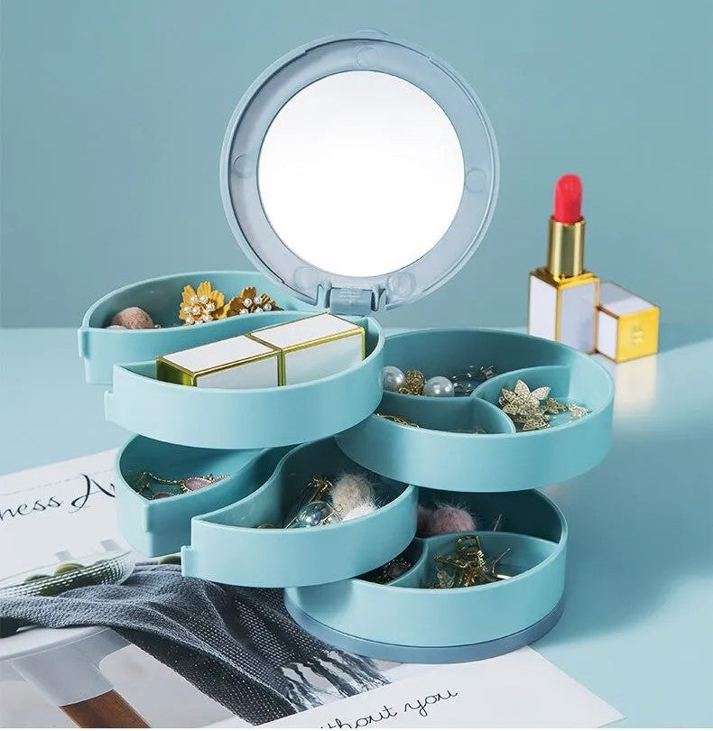 Blauer Schmuck-Organizer mit Spiegel, drehbaren Fächern, Schmuckaufbewahrung, Lippenstift.