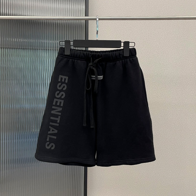 Schwarze Essentials-Shorts, Baumwolle, Kordelzug, Herrenmode, sportlich, bequem.