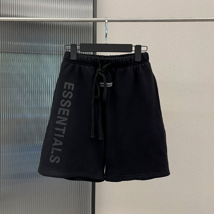 Schwarze Essentials-Shorts, Baumwolle, Kordelzug, Herrenmode, sportlich, bequem.