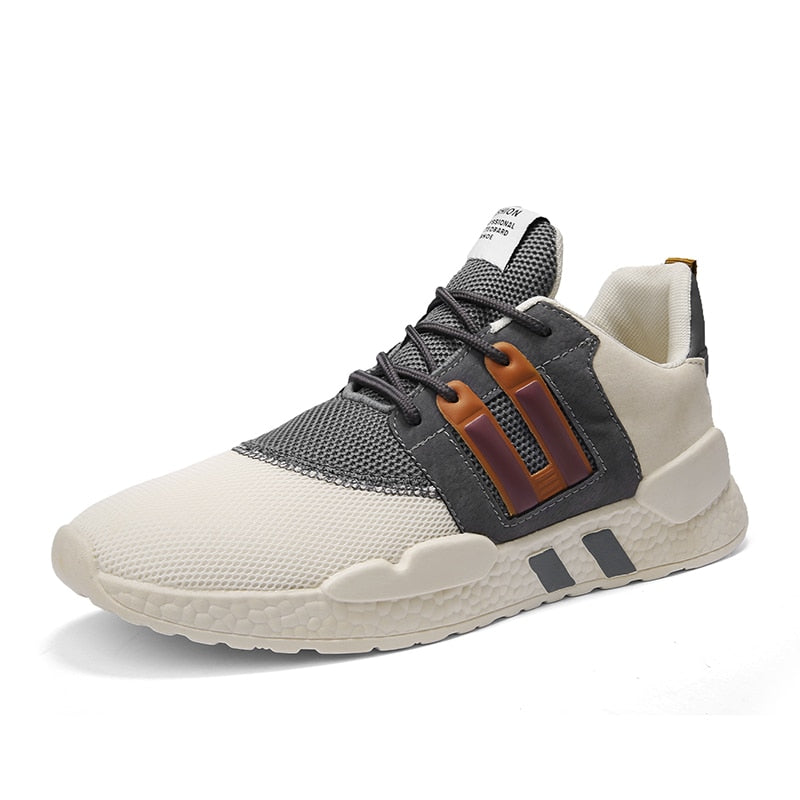 Grauer und weißer Sneaker, atmungsaktives Mesh, sportlich, modisch, Herren-Freizeitschuh.