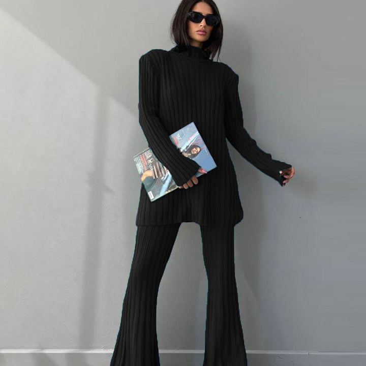 Schwarzer gerippter Damen-Zweiteiler, langärmelig, modisch, elegant, mit Sonnenbrille.