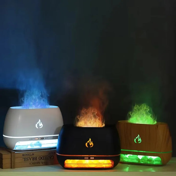 Drei Aromadiffusoren mit LED-Flammen, schwarz, weiß, holzoptik, stimmungsvolle Beleuchtung.