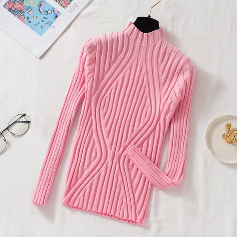 Rosa gerippter Rollkragenpullover aus Strickstoff, Damenmode, elegant und stilvoll.