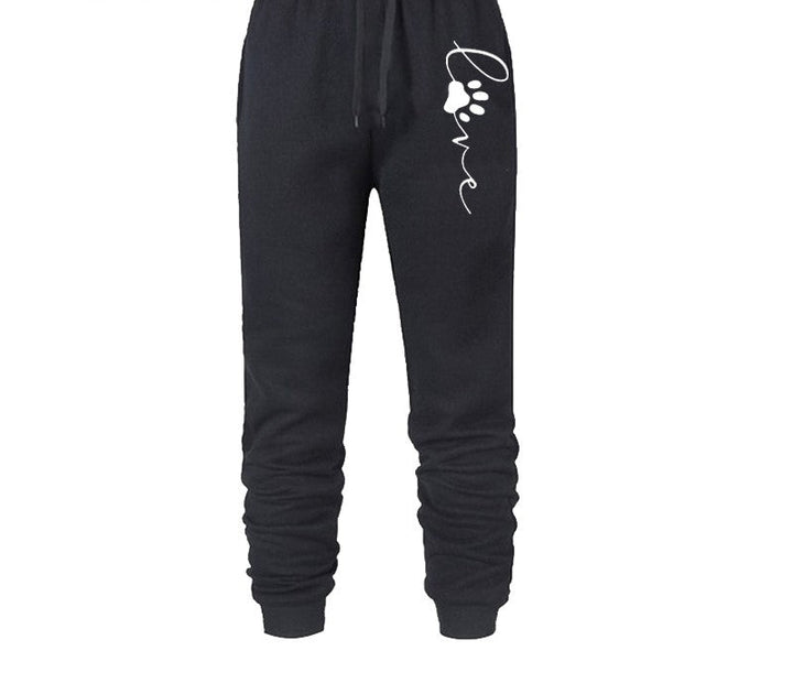 Schwarze Jogginghose mit "Love"-Aufdruck und Pfotenmotiv, bequem, Baumwolle, Damenmode.