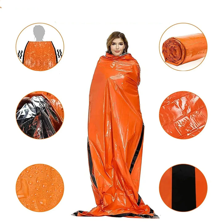 Orangefarbener Notfall-Biwaksack, wasserdicht, wärmeisolierend, für Outdoor-Abenteuer.