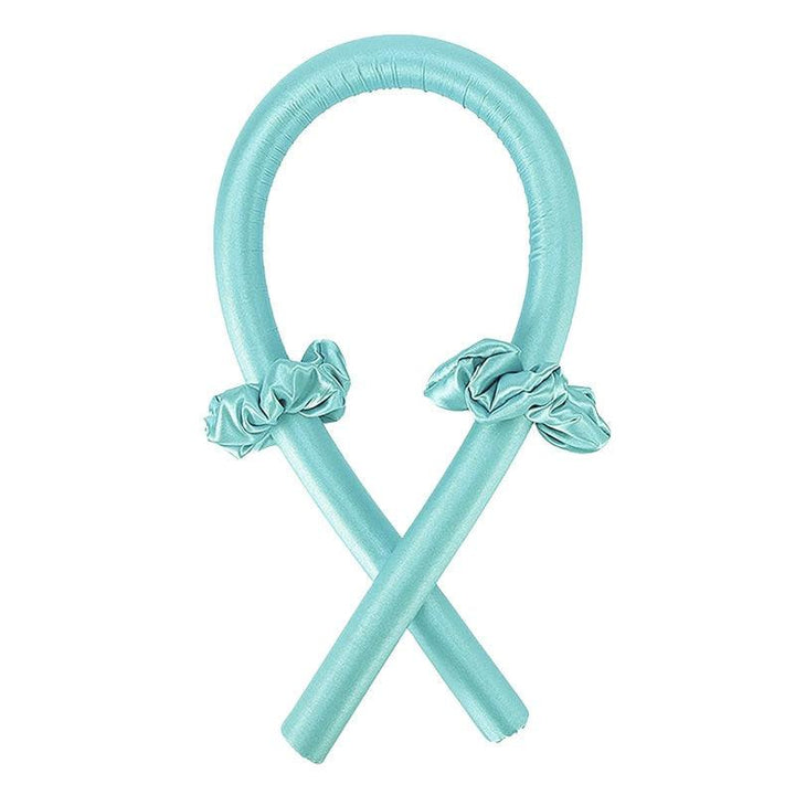 Türkises Haarstyling-Tool aus Satin für Locken ohne Hitze.