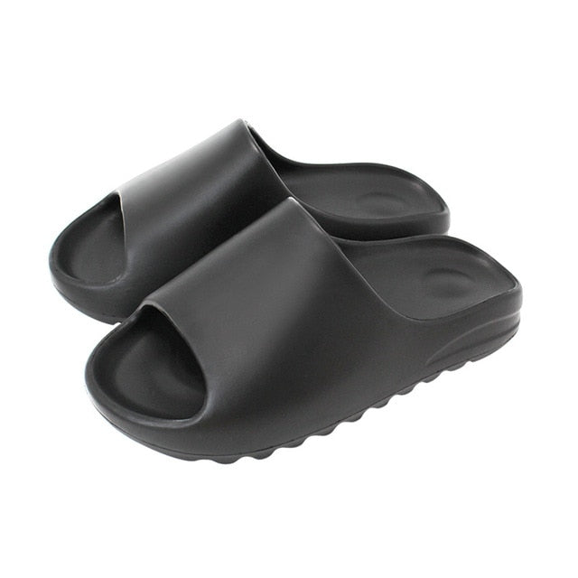 Schwarze Badeschlappen aus Gummi, rutschfest, bequem, für Damen und Herren.