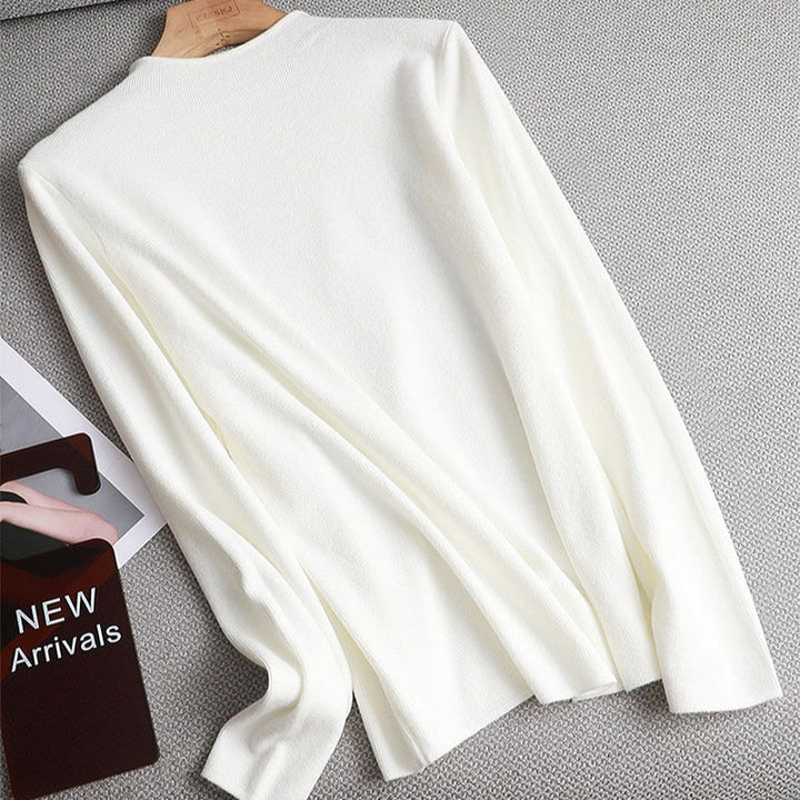 Weißer Damenpullover aus Baumwolle, langärmelig, elegant, modisch, Herbstbekleidung.