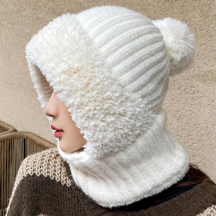 Damen Wintermütze mit Schal, weiß, Strick, warm, modisch, mit Bommel, für kalte Tage.