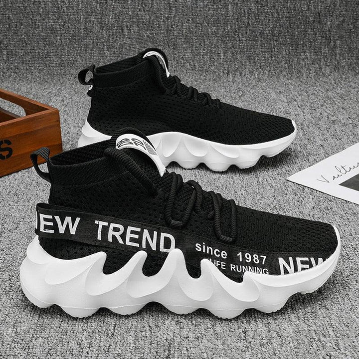 Schwarze Sneaker mit weißer Sohle, atmungsaktives Mesh, modisches Design, Herrenlaufschuhe.