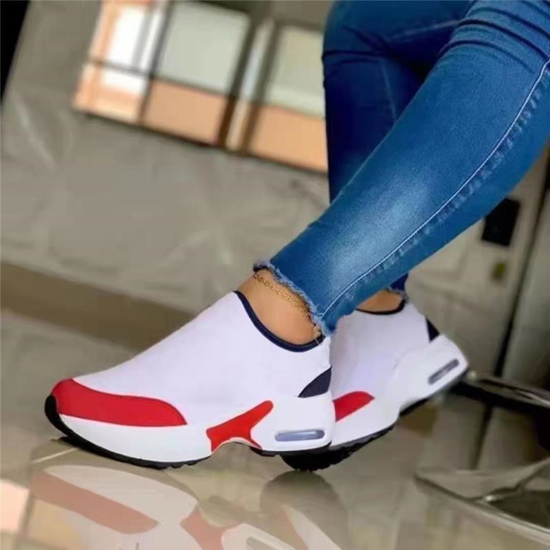 Weiße Sneaker mit roten und schwarzen Akzenten, Damenmode, bequeme Freizeitschuhe.