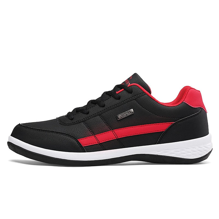 Schwarzer und roter Herren-Sneaker, Leder, sportlich, bequem, rutschfest, modisch.