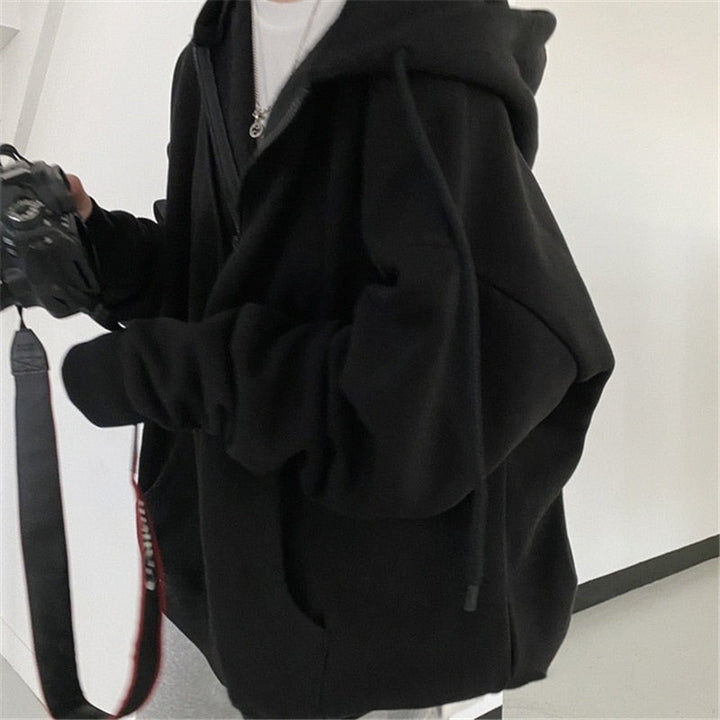 Schwarzer Unisex Hoodie, Baumwolle, lässig, mit Kapuze, ideal für Herbstmode, Streetwear.