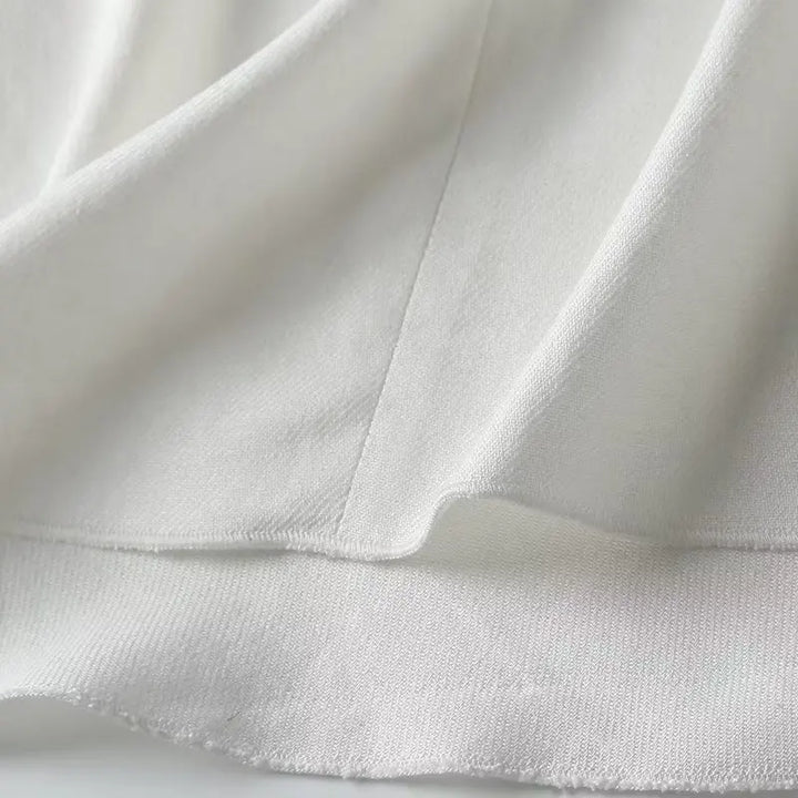 Bílý, vzdušný a elegantní bezrukávový lněný top pro ženy – Amira