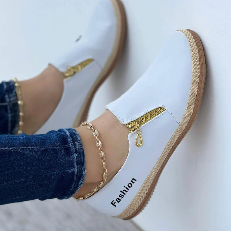 Weiße Damen-Sneaker mit goldenen Reißverschlüssen, modisch, bequem, Freizeitschuh.