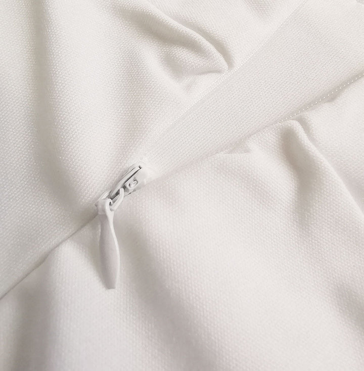 Weißer Stoff mit Reißverschluss, Textilmaterial, Nahaufnahme, Mode, Bekleidung, Detailansicht