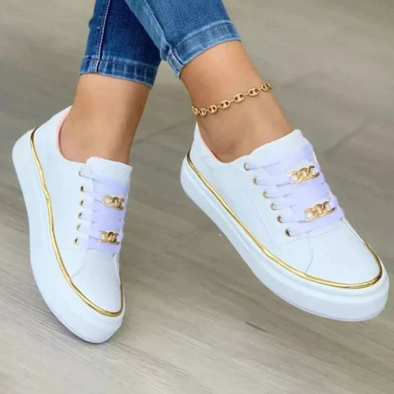 Weiße Damen-Sneaker mit goldenen Details, lässig, modisch, bequem, ideal für Alltag.